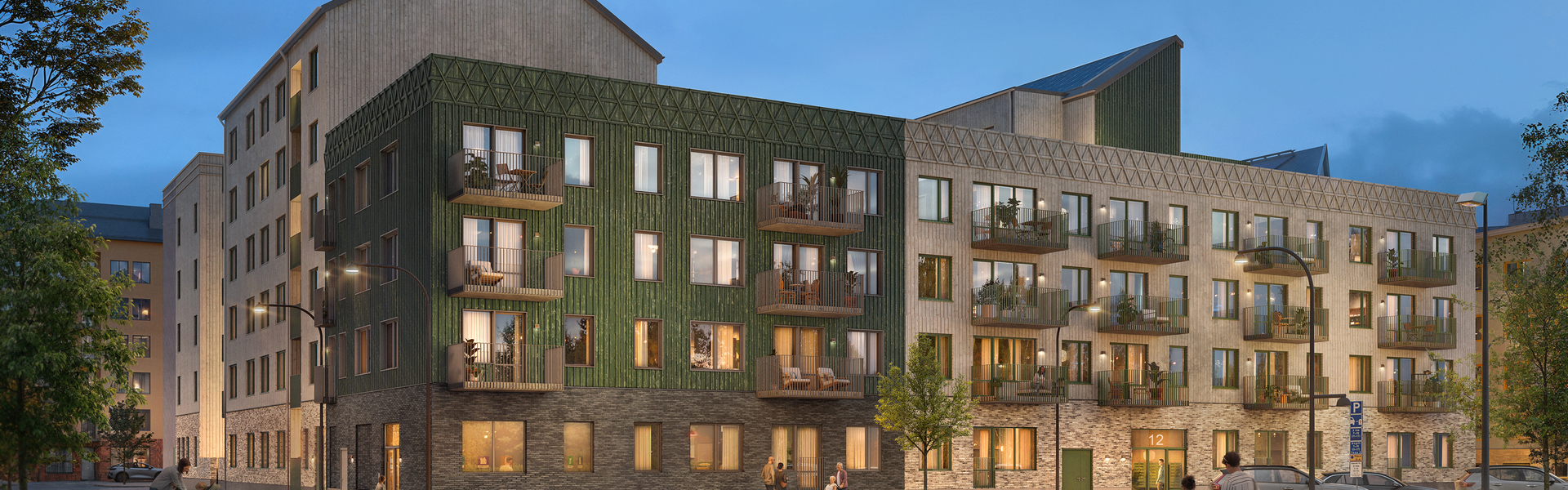Visionsbild av nyproducerat bostadshus med balkonger intill park i kvällsljus.